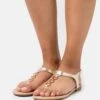 T-Bar Sandals - Gold